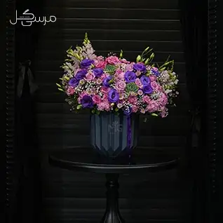 باکس گل زیبای بنفش صورتی با گلدان سرامیکی برای عرض تبریک